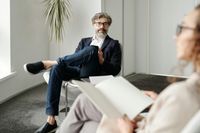 Man and woman talking in an office